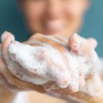 Person washing her hands